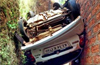 Kasargod : Couple critical after speeding car rolls over house